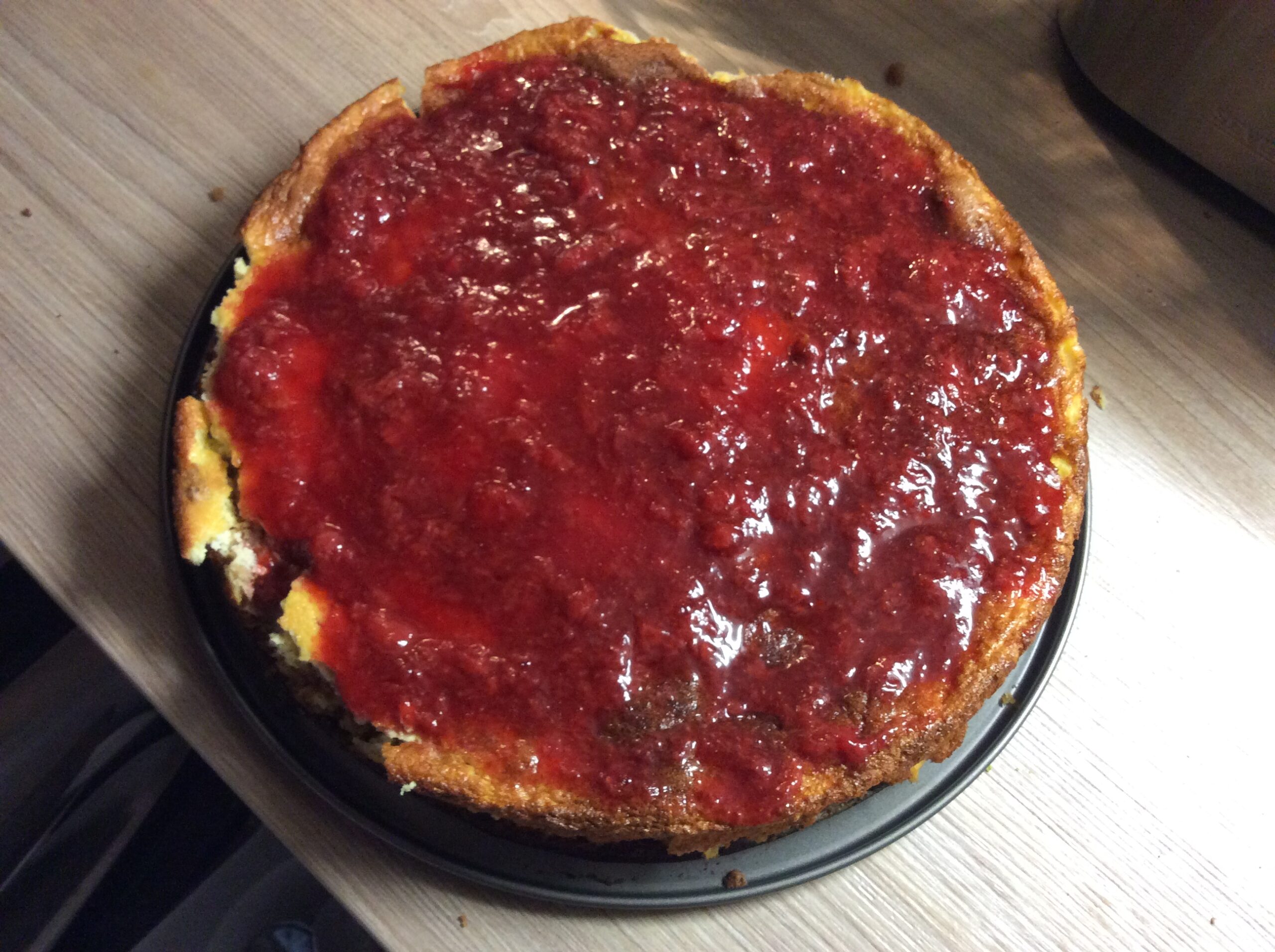 Cheesecake with homemade strawberry jam