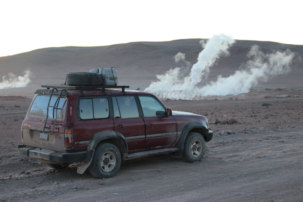 Our jeep and the geysers
