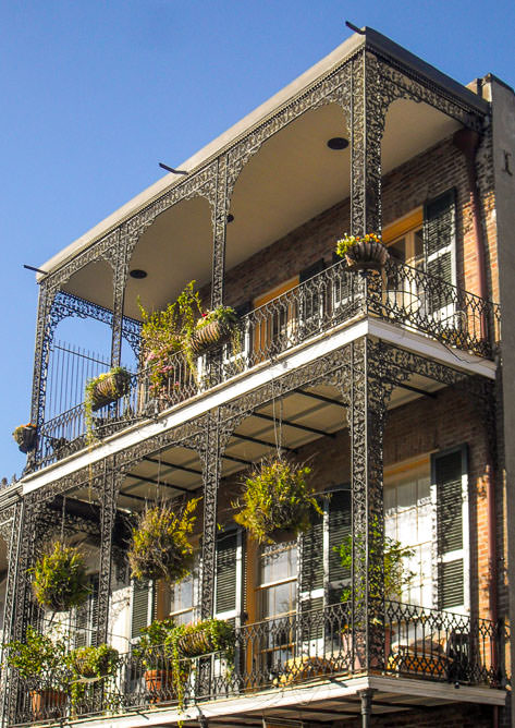 The French Quarter architecture features many cast iron balconies