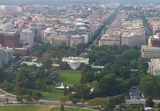 The White House can be seen at the North of the Washington Monument
