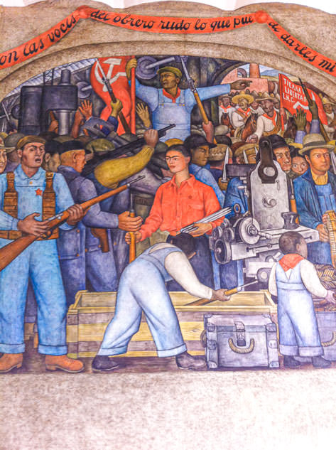 The arsenal, a mural by Diego Rivera starring her wife Frida Kahlo