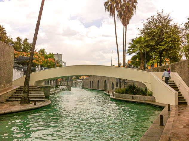 Paseo Santa Lucía features bridges and lush greenery