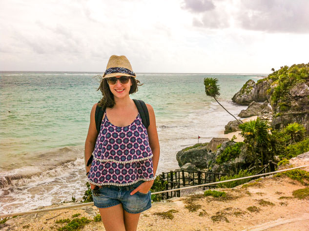 Posing while visiting the ruins in Tulum