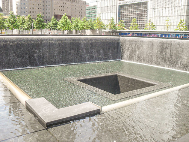 The pools in the World Trade Center area symbolize remembrance for the victims in the 9/11 attacks