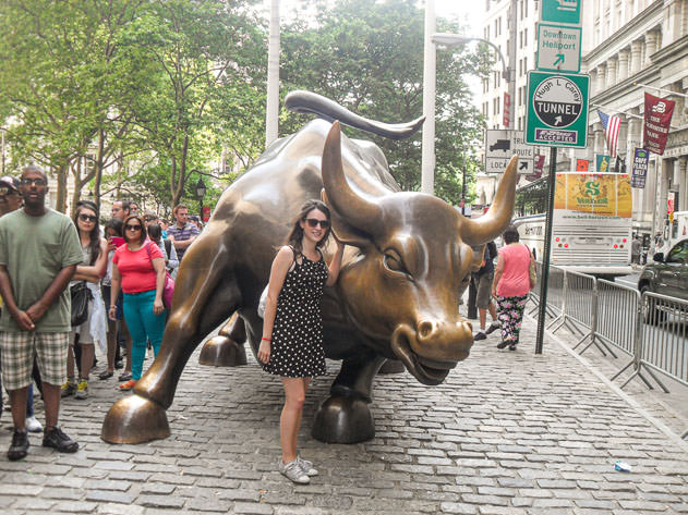 Posing with the Charging Bull in the financial district of New York City