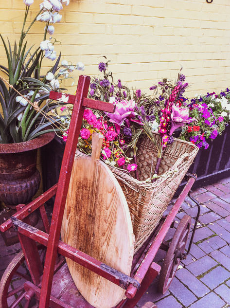 A cute cart filled with flowers