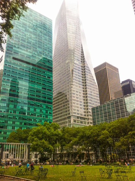 Bryant Park is surrounded by skyscrapers