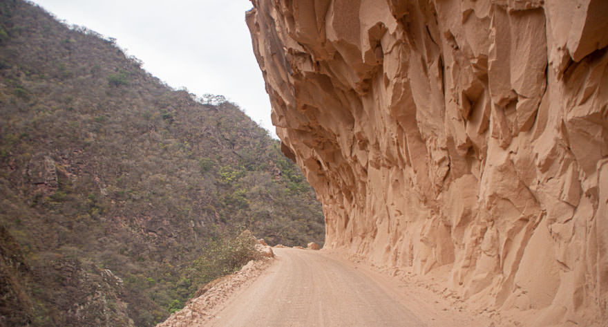 Dangerous road carved on rock leading to Villa Montes