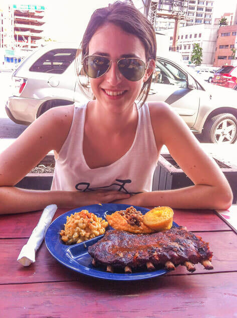 Happy customer at Dinosaur Bar-B-Que