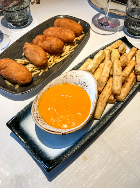 Croquetas de jamón along with palitos de berenjena con salmorejo