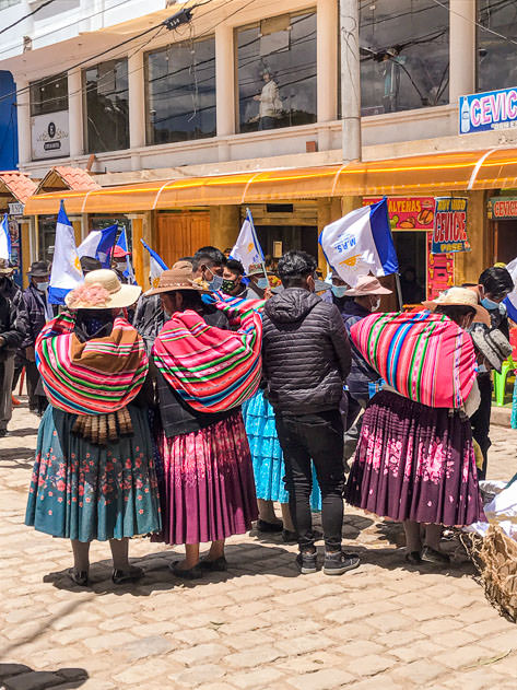 Indigenous women attending an electoral march in Copacabana