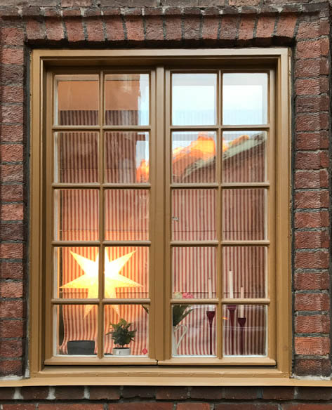 Starshaped lamps and candle lights are a traditional feature in Swedish houses before Christmas