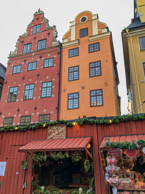 Colorful houses surround the Christmas market in Stortorget