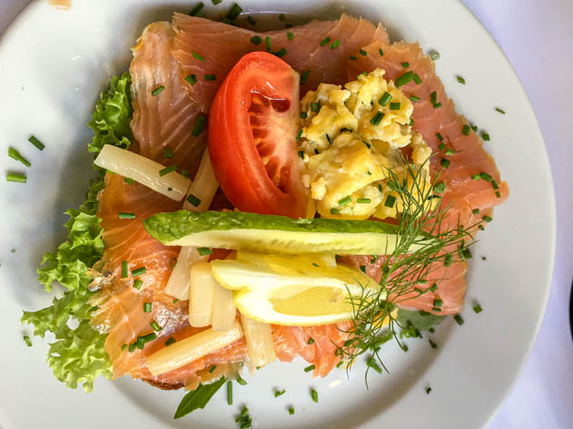 Smørrebrød with salmon and scrambled eggs at Cafe Nytorv
