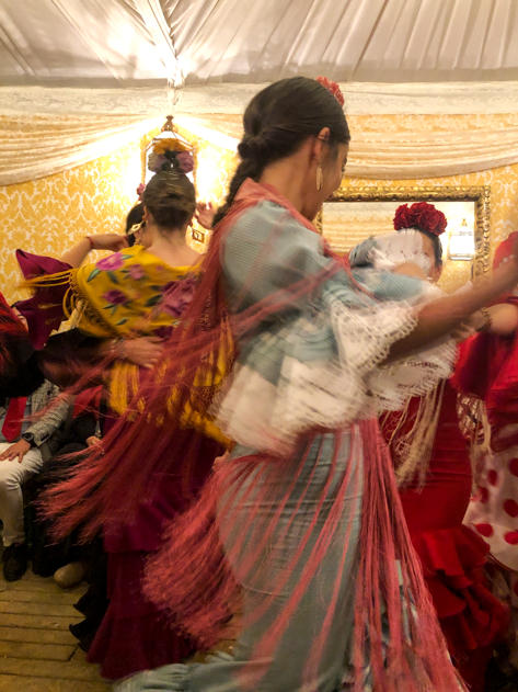 Flamencas dancing sevillanas