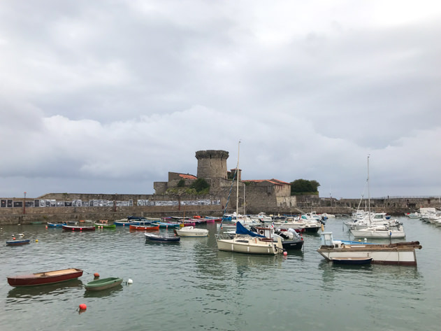 The Socoa fortress surrounded by fishing boats