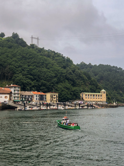 Green boat connecting Pasai San Pedro and Pasai Donibane