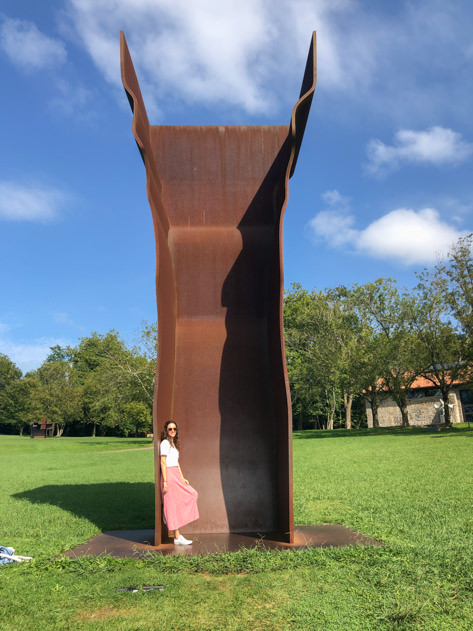 Posing with one of Chillida's sculptures