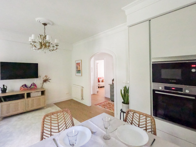 Renovated kitchen opening to the living room