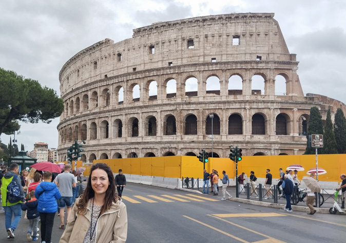Posing in front of the world-famous Colosseum