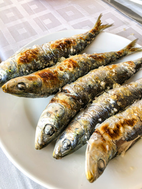 Try the 'espetos' of sardines when visiting Málaga!