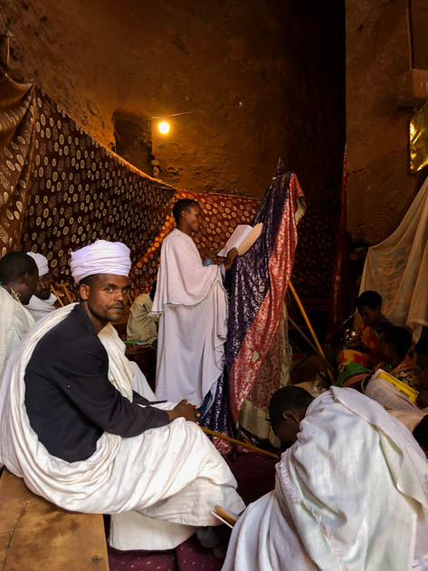 Orthodox priest and students in Bete Abba Libanos