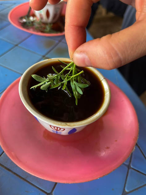 Ethiopian coffee served with rue