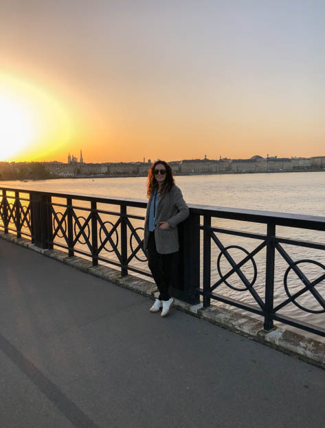 Posing in Pont de Pierre during sunset