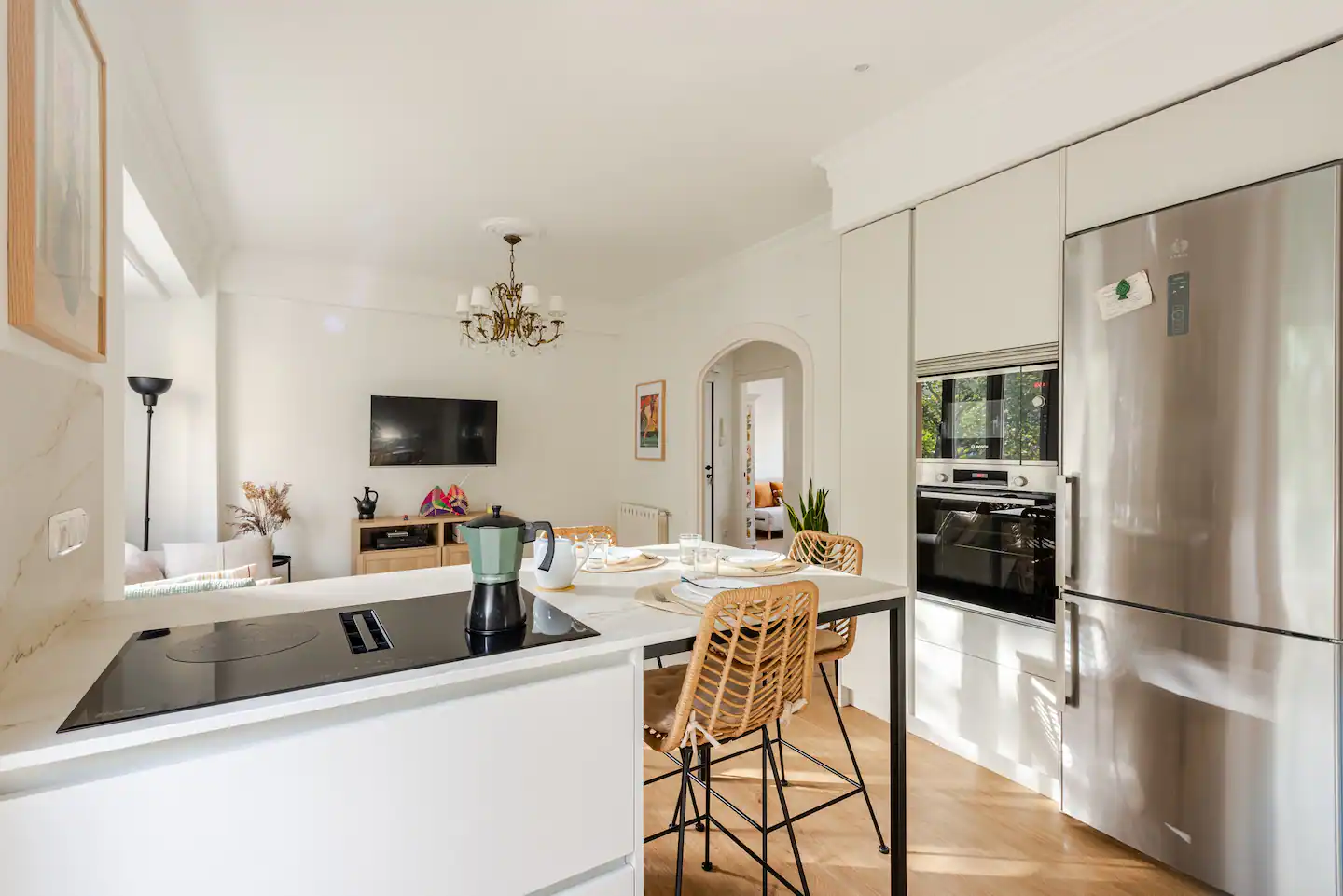 Bright kitchen opening to the living room