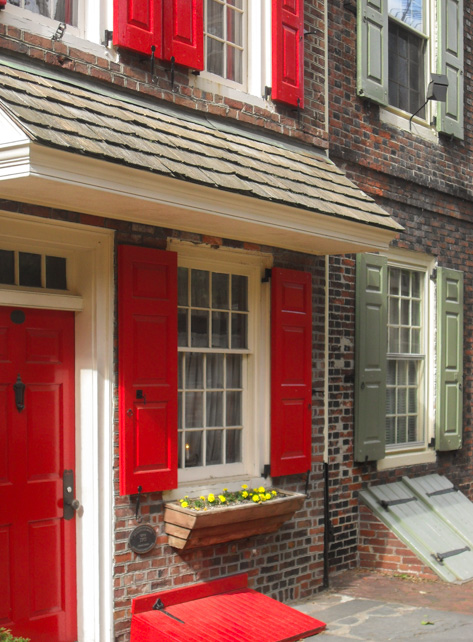 Colorful historic row houses along Elfreth’s Alley, the oldest residential street in the United States