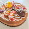 Traditional Basque opilla cake from Irún decorated with eggs and candies