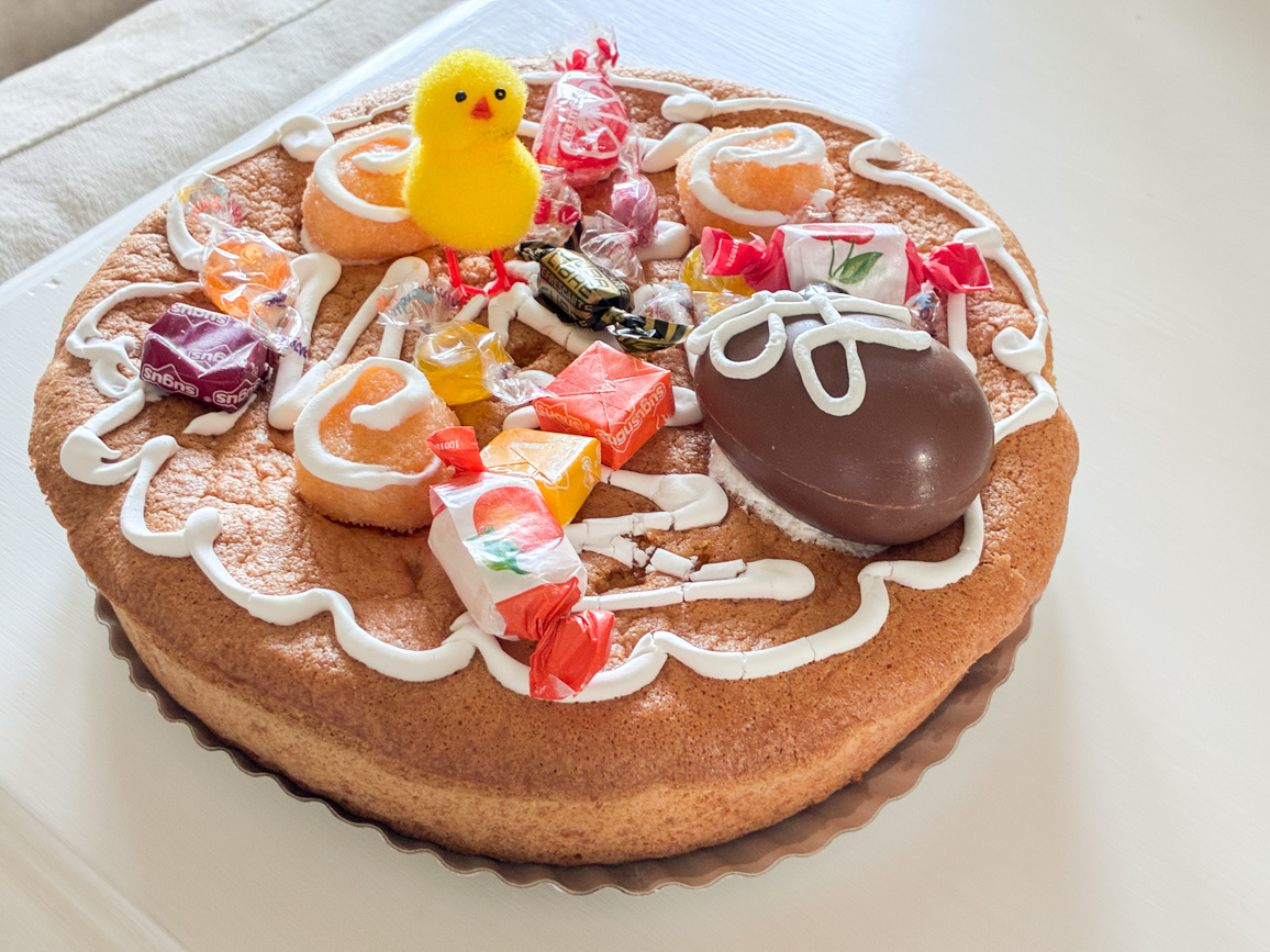 Traditional Basque opilla cake from Irún decorated with eggs and candies